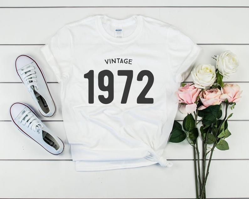 Vintage 1972 Men's and Women's Letters T-Shirt featuring a stylish print design and comfortable fit.