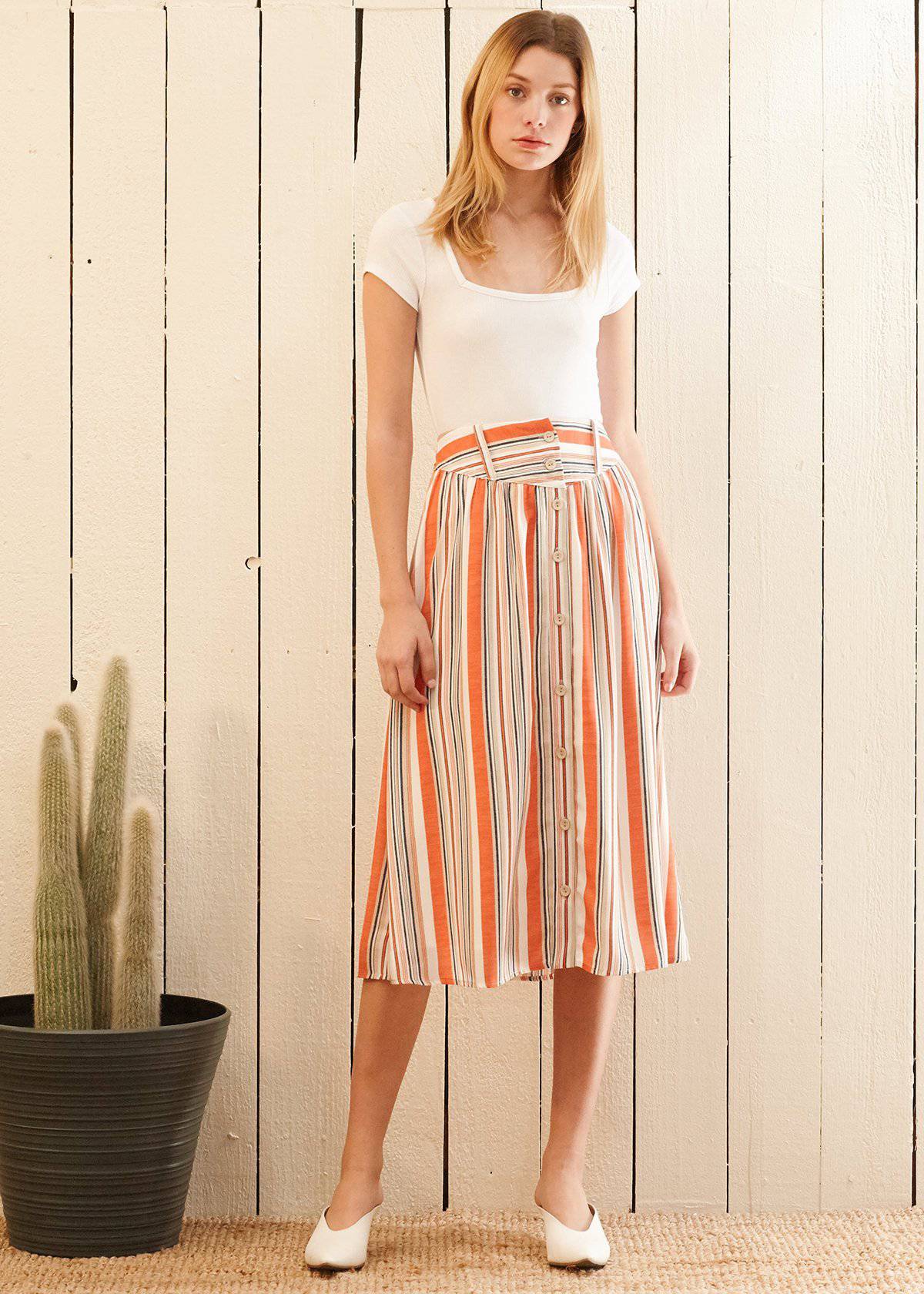 Women's Multi Stripe Button Front Midi Skirt in Rust Multi, featuring a stylish stripe pattern and front button closure, fully lined for comfort.