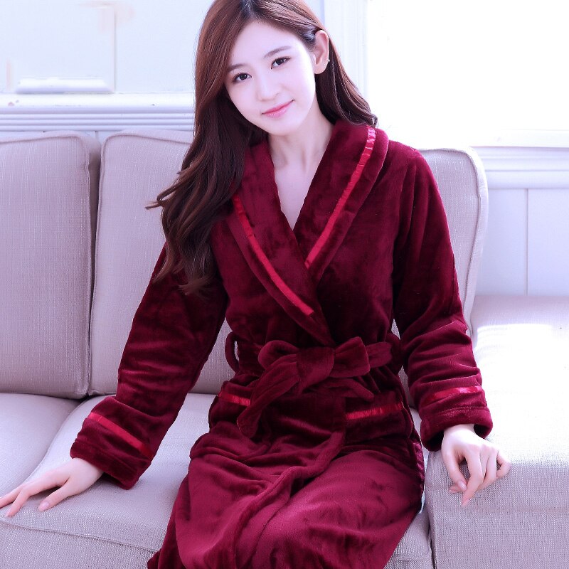 A luxurious women's fleece bathrobe in various colors, featuring a stylish plaid pattern, perfect for winter nights and cozy lounging.