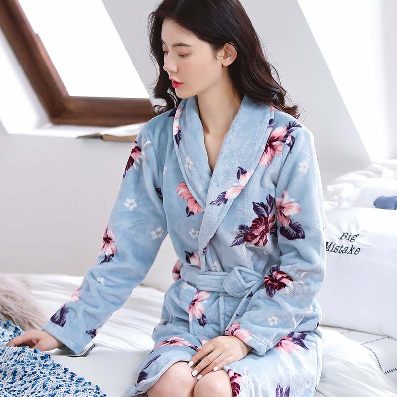 A luxurious women's fleece bathrobe in various colors, featuring a stylish plaid pattern, perfect for winter nights and cozy lounging.