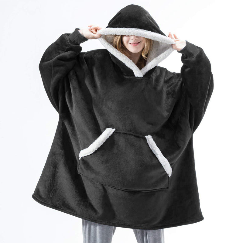 A cozy Winter Warm Fleece Wearable Hooded Blanket in a soft plaid design, featuring an extra-large hood and a roomy pocket, perfect for lounging.