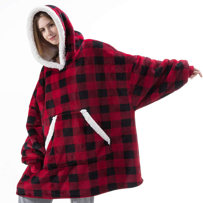 A cozy Winter Warm Fleece Wearable Hooded Blanket in a soft plaid design, featuring an extra-large hood and a roomy pocket, perfect for lounging.