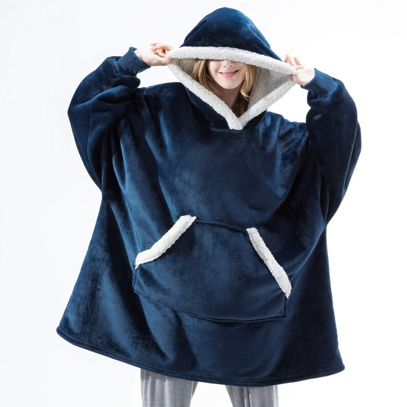 A cozy Winter Warm Fleece Wearable Hooded Blanket in a soft plaid design, featuring an extra-large hood and a roomy pocket, perfect for lounging.