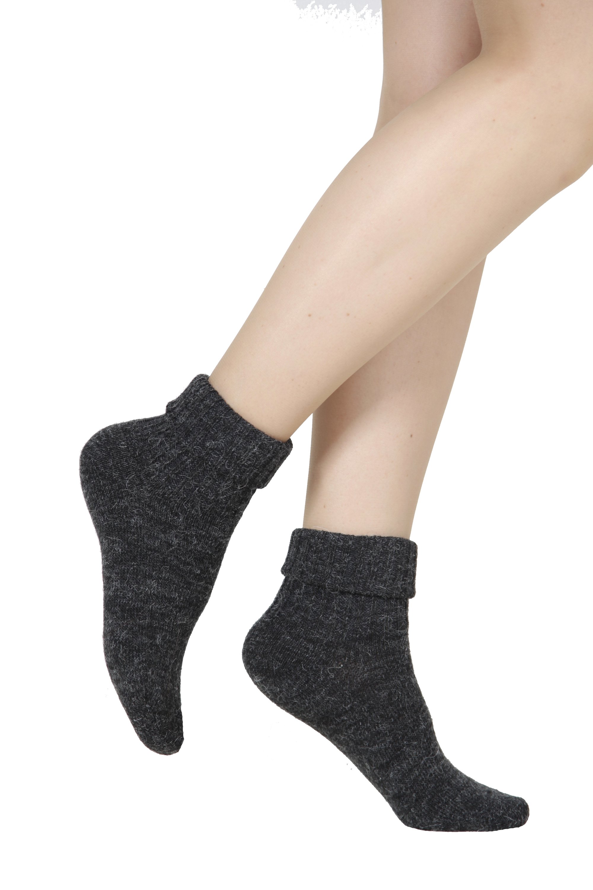 ALPAKA black socks made from luxurious alpaca wool blend, showcasing their soft texture and stylish design.