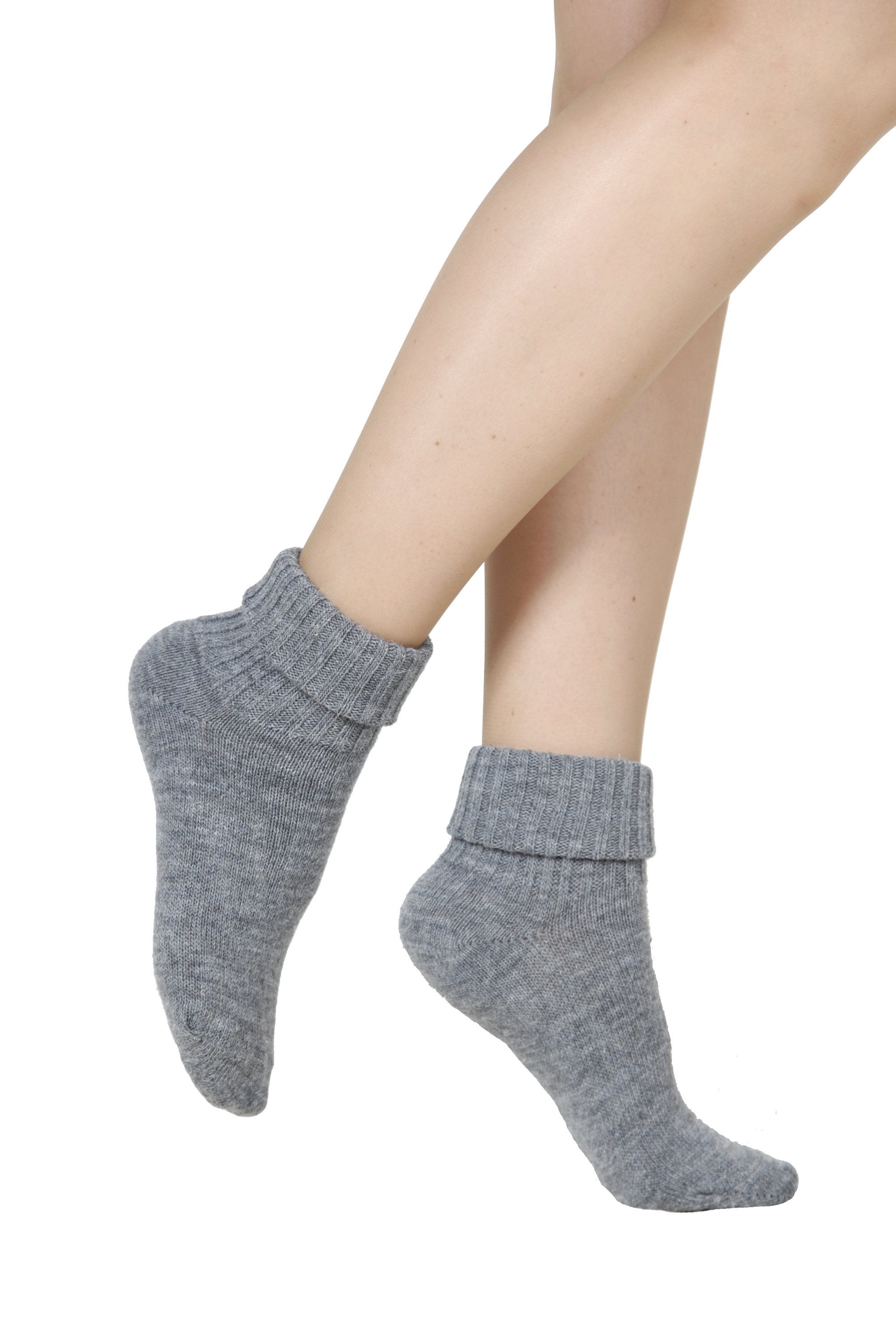 ALPAKA grey socks made from luxurious alpaca wool, showcasing their soft texture and elegant design.