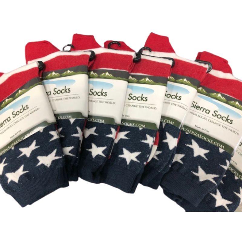 A pair of American Flag Patriotic Socks featuring vibrant red, white, and blue colors with stars and stripes, made from premium quality cotton.