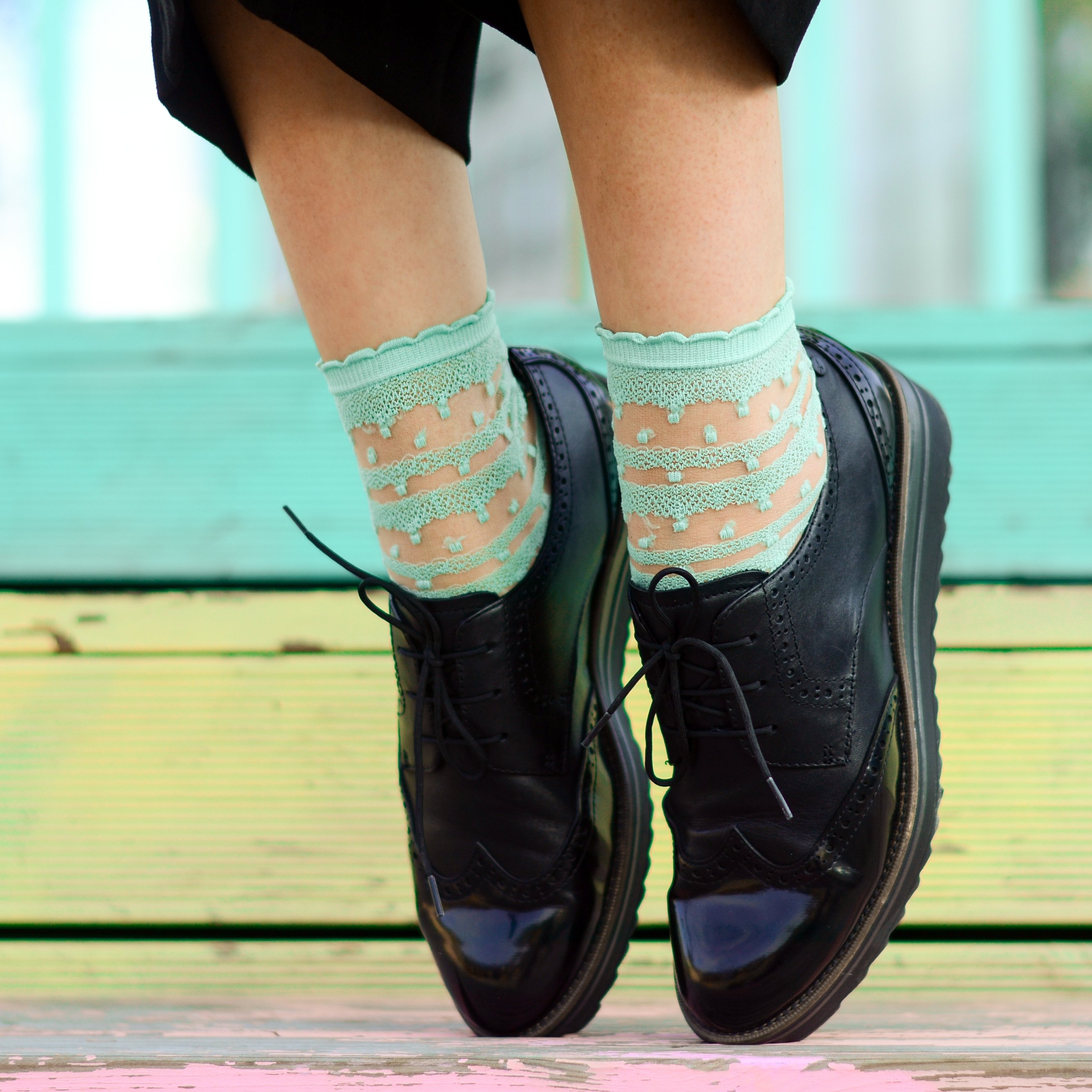 ANTONINA sheer light green socks for women featuring an elegant lacy pattern, made from 100% polyamide, perfect for stylish outfits.