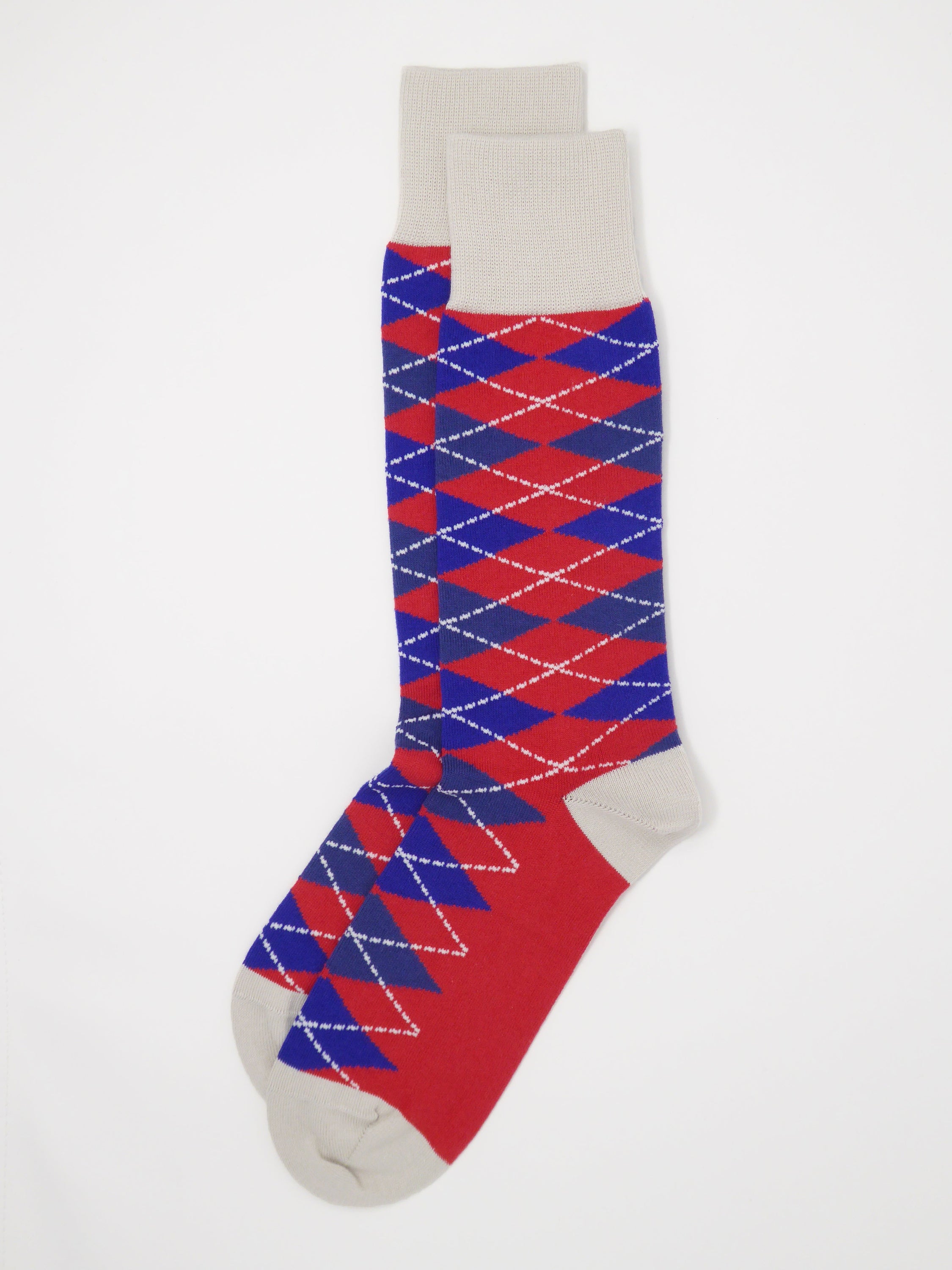 Argyle Men's Socks in Crimson featuring a vibrant red and blue pattern with grey cuff, heel, and toe, made from luxurious Supima cotton.