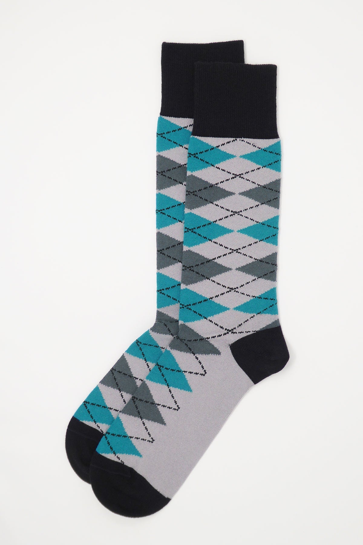 A pair of Argyle men's socks in grey and blue with black heel, cuff, and toe, showcasing a modern twist on a classic design.