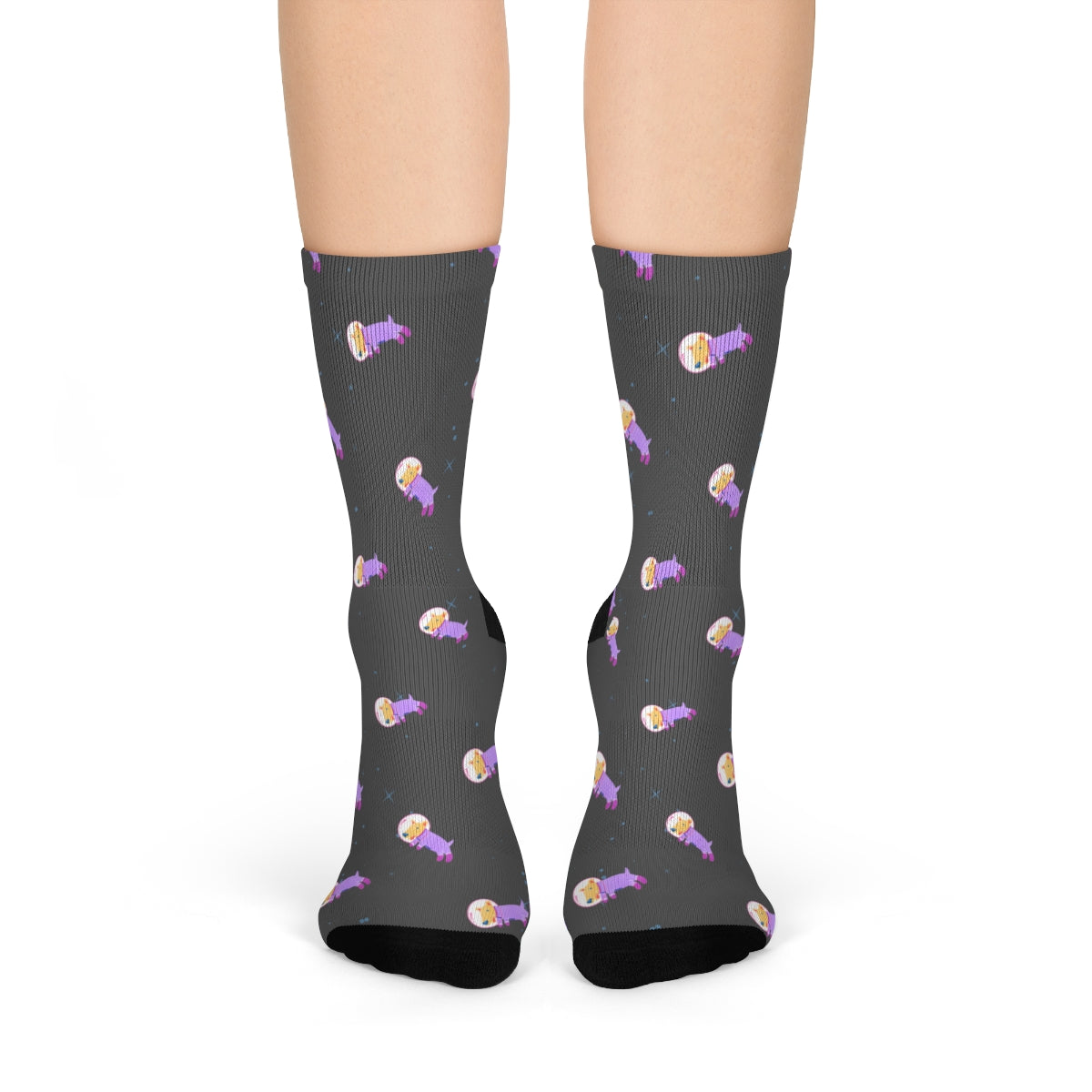 A pair of fun socks featuring a whimsical astronaut dog design, perfect for adding a playful touch to any outfit.