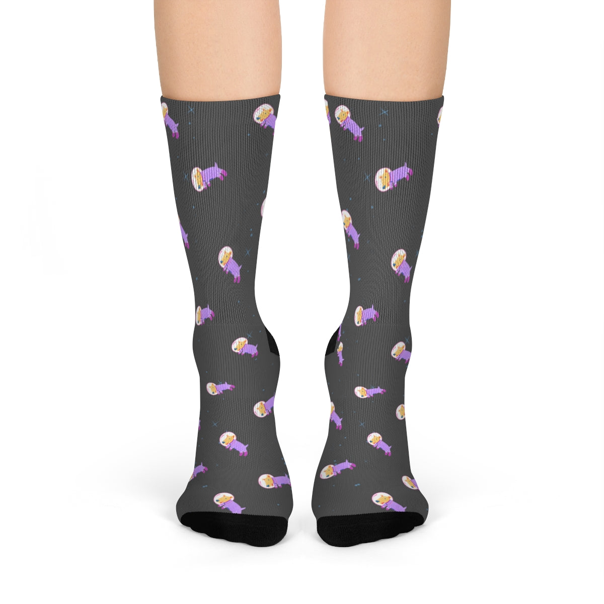 A pair of fun socks featuring a whimsical astronaut dog design, perfect for adding a playful touch to any outfit.