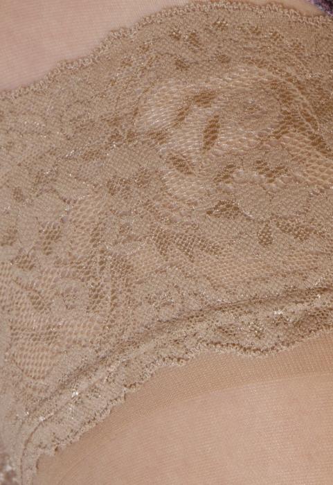 Beautiful natural hold-ups featuring a lacy silicone edge and sheer toe design, perfect for elegant styling.