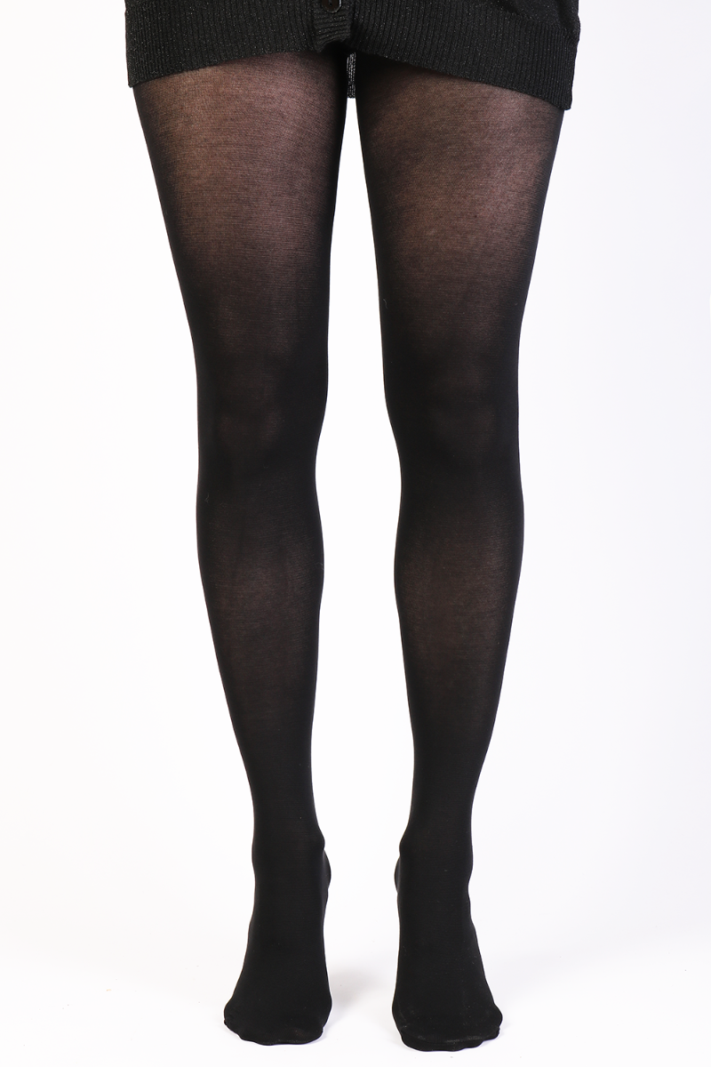 A pair of black tights made from organic cotton, showcasing their soft texture and eco-friendly design.