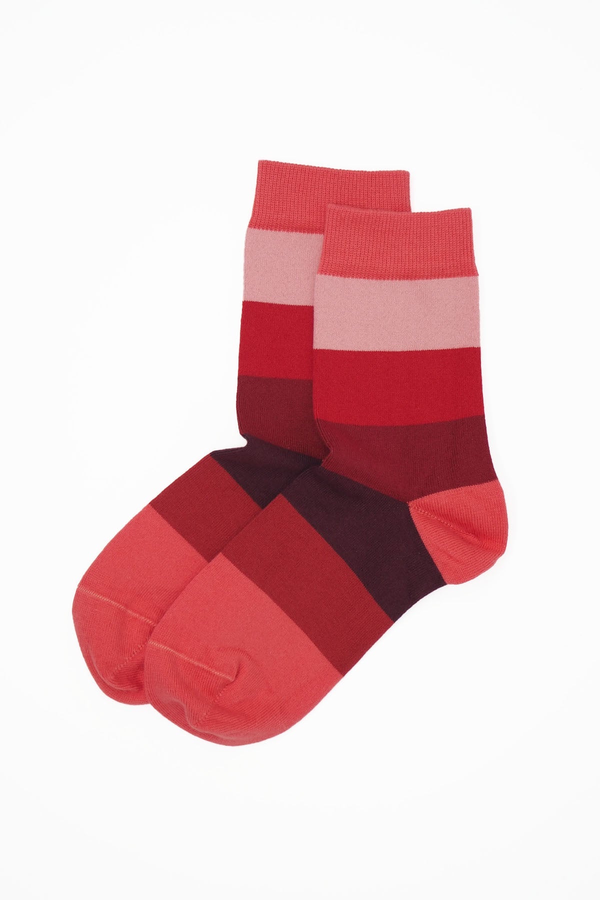 Block Stripe Women's Socks in Fire featuring vibrant red stripes, made from luxurious Supima cotton.