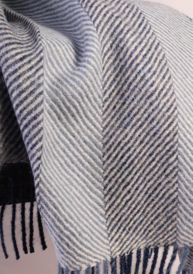 Luxurious blue herringbone patterned alpaca wool plaid, showcasing its soft texture and elegant design, perfect for autumn and winter.