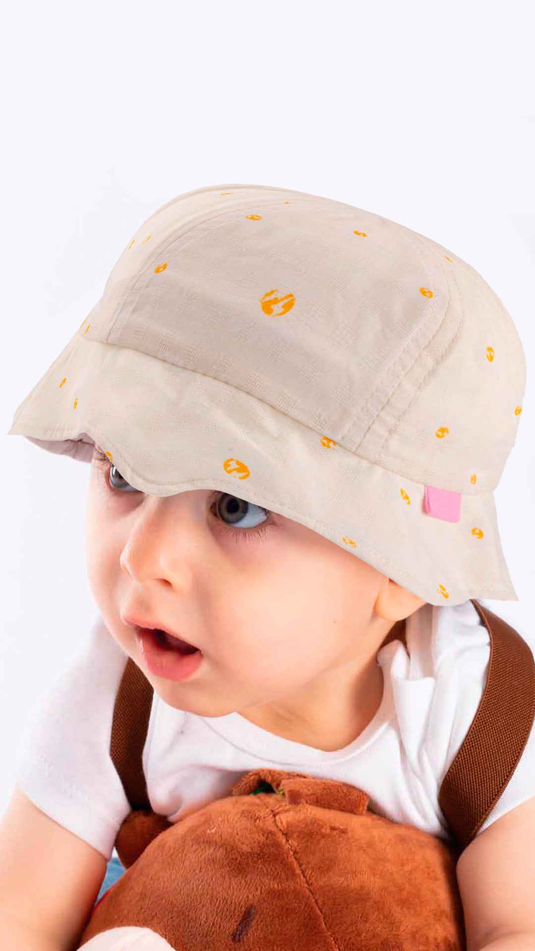 Breathable overall print kids cap in white, designed for ages 4-8, perfect for sun protection at the beach or pool.