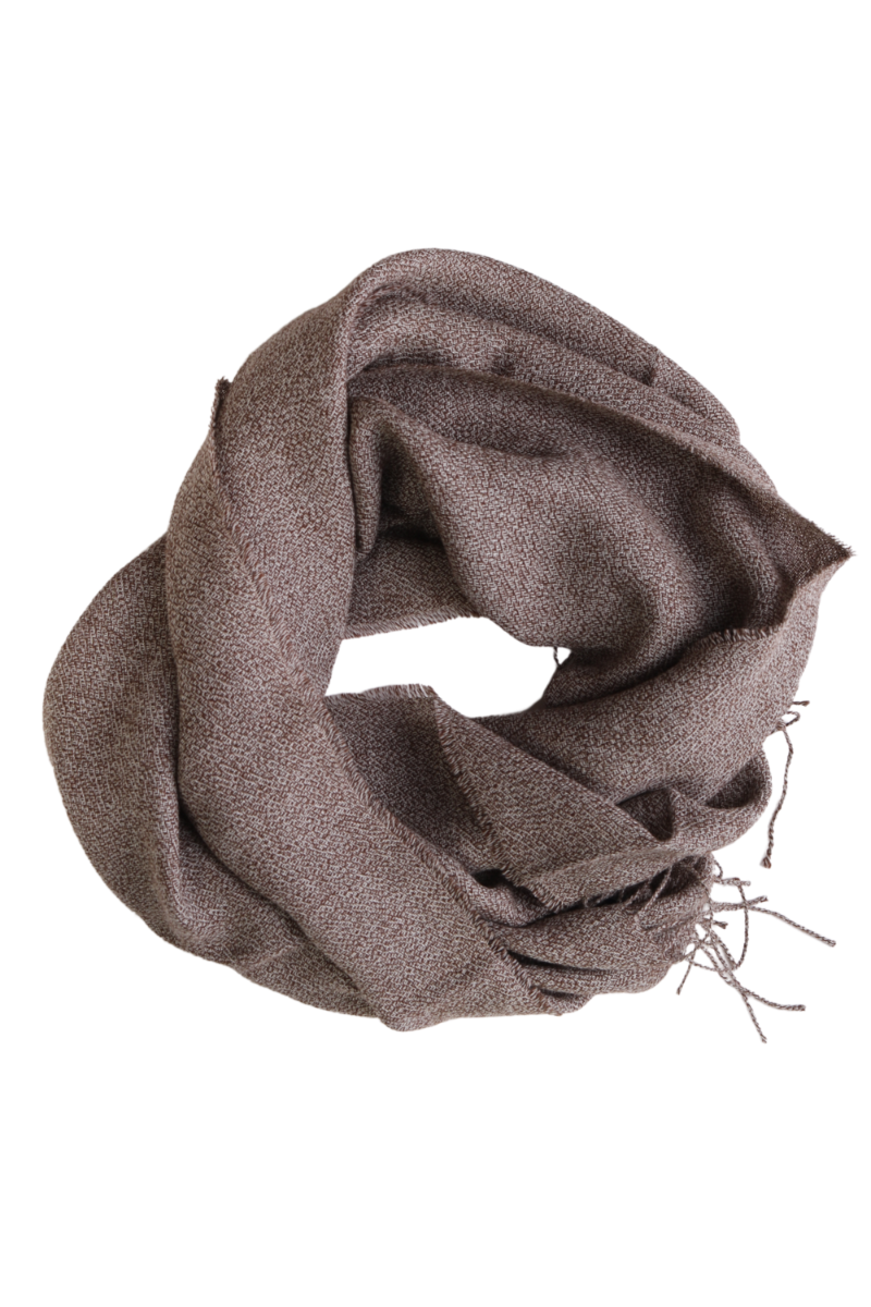 A luxurious brown ruffled alpaca wool scarf draped elegantly, showcasing its soft texture and stylish design.