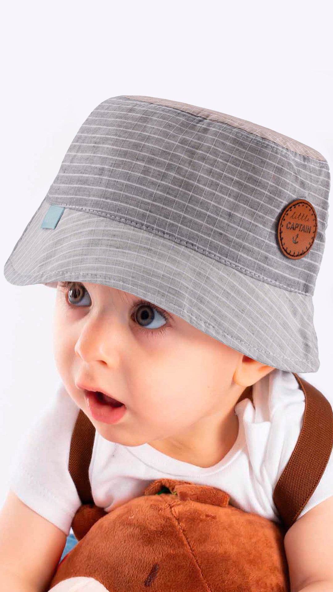 Checked Little Captain Badge Infant Fedora Hat in white, made from soft cotton and polyester blend, designed for ages 0-18 months.