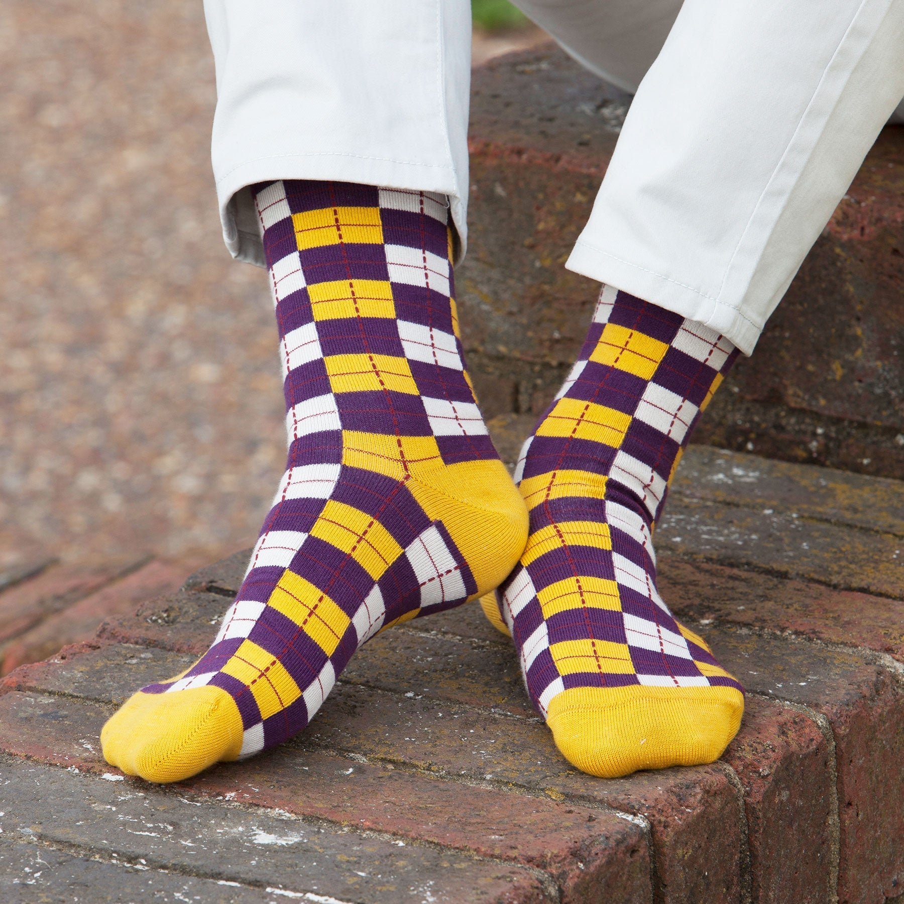 Checkmate Men's Socks in vibrant gold, showcasing luxurious Supima cotton and seamless toe design.