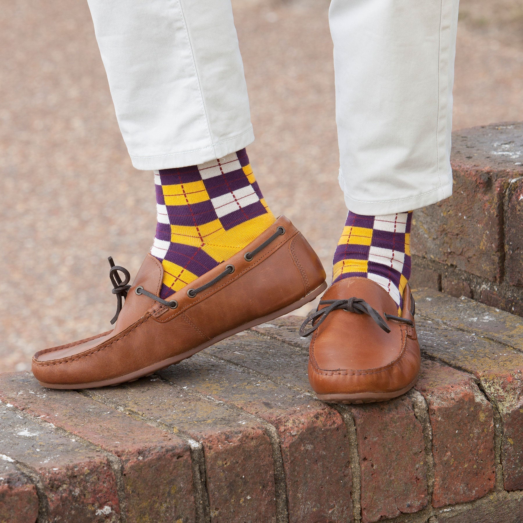 Checkmate Men's Socks in vibrant gold, showcasing luxurious Supima cotton and seamless toe design.