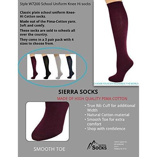 A pack of three pairs of Classic Flat Knit Combed Cotton Knee High Socks in assorted colors, showcasing their smooth texture and relaxed rib cuff design.