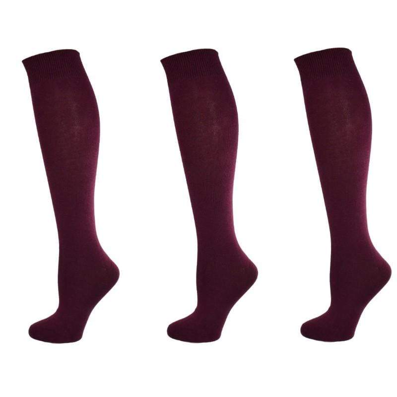 A pack of three pairs of Classic Flat Knit Combed Cotton Knee High Socks in assorted colors, showcasing their smooth texture and relaxed rib cuff design.