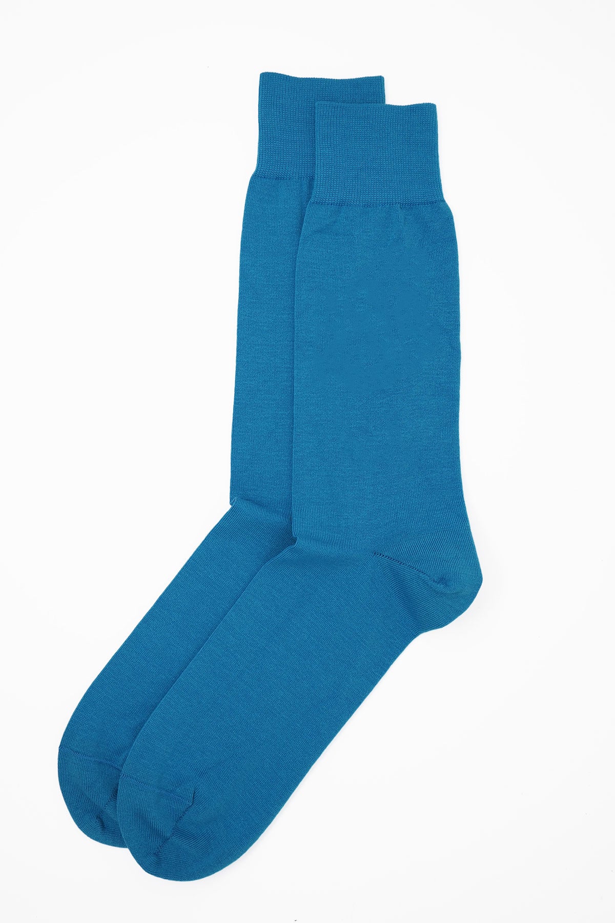 A pair of vibrant blue classic men's socks made from luxurious Mercerised Egyptian cotton, showcasing a seamless toe design.