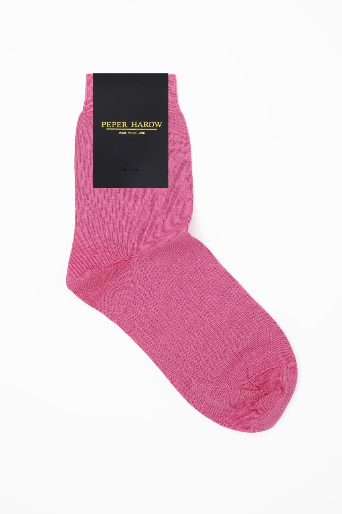 A pair of vibrant pink classic women's socks made from luxurious Egyptian cotton, showcasing a seamless toe design.