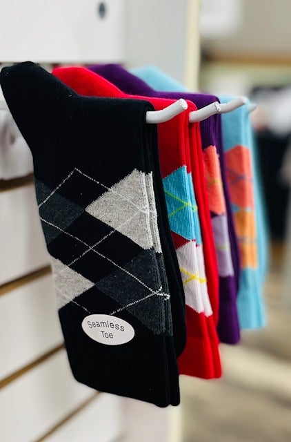 A pair of vibrant Cotton Argyle Crew Women's Socks featuring colorful argyle patterns, designed for comfort and style.