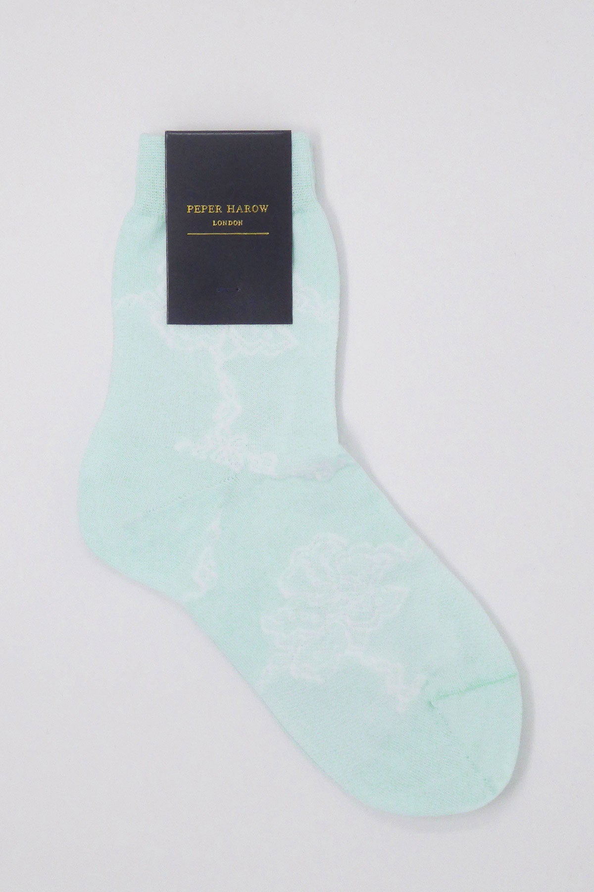 Celeste Delicate Women's Socks featuring a white lace floral pattern on a soft celeste background, perfect for summer outfits.