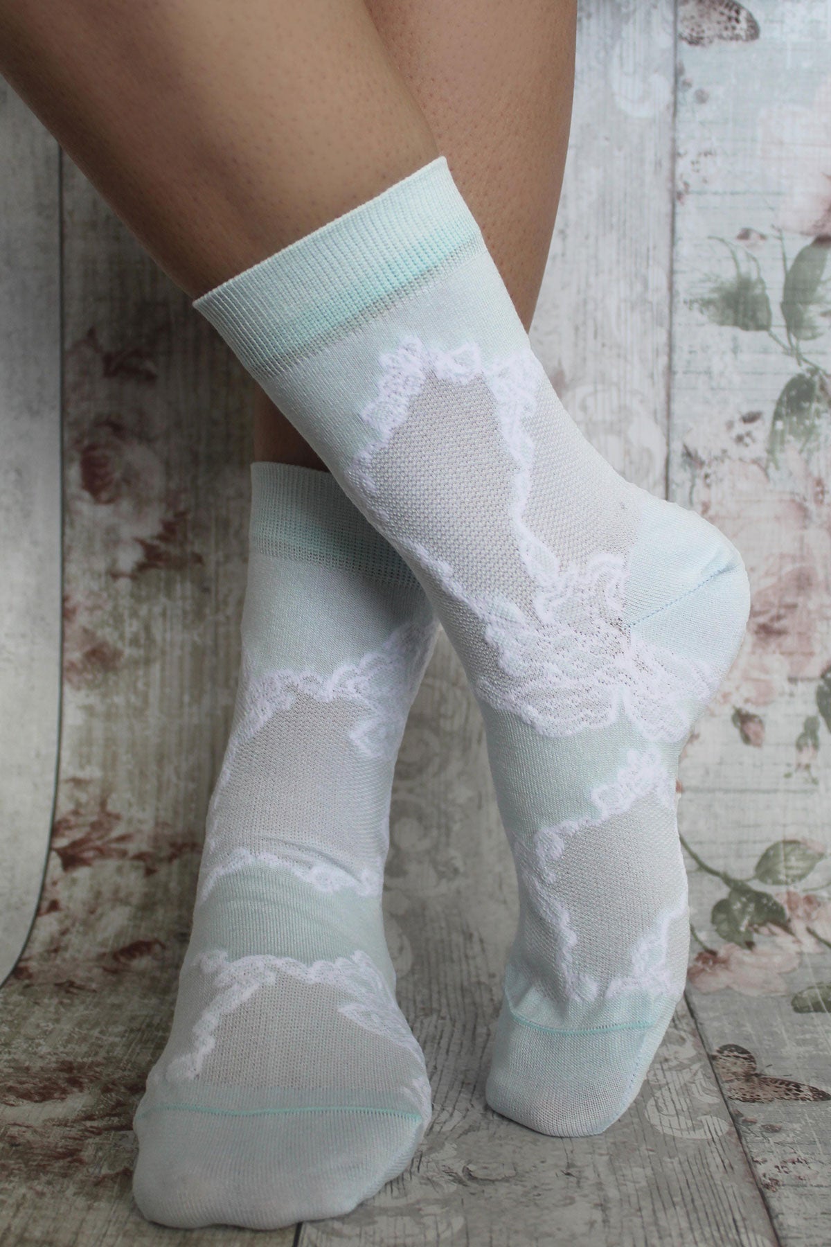 Celeste Delicate Women's Socks featuring a white lace floral pattern on a soft celeste background, perfect for summer outfits.