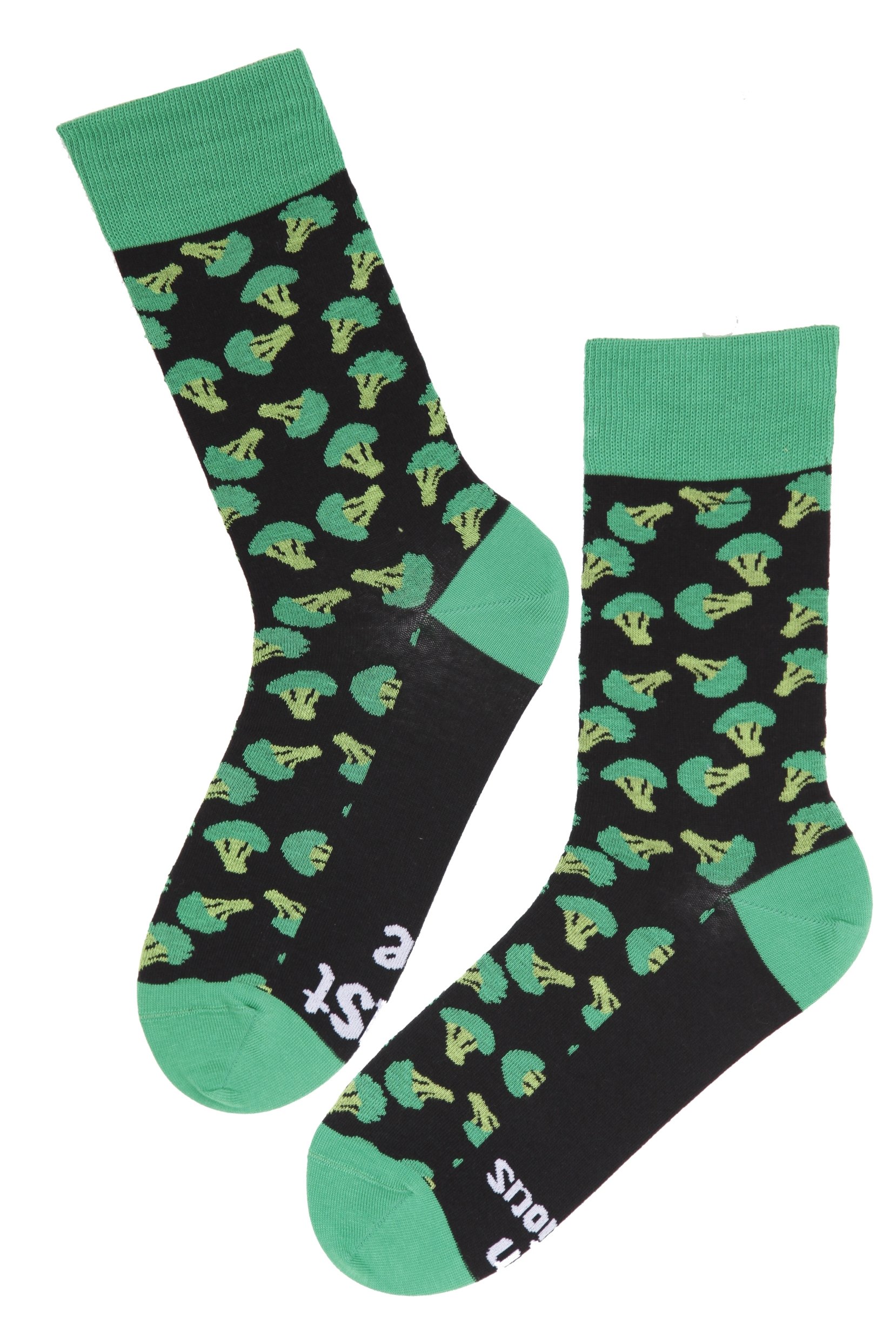 A pair of black cotton chef socks featuring a broccoli design and the phrase 'Trust me, I'm delicious' under the soles.