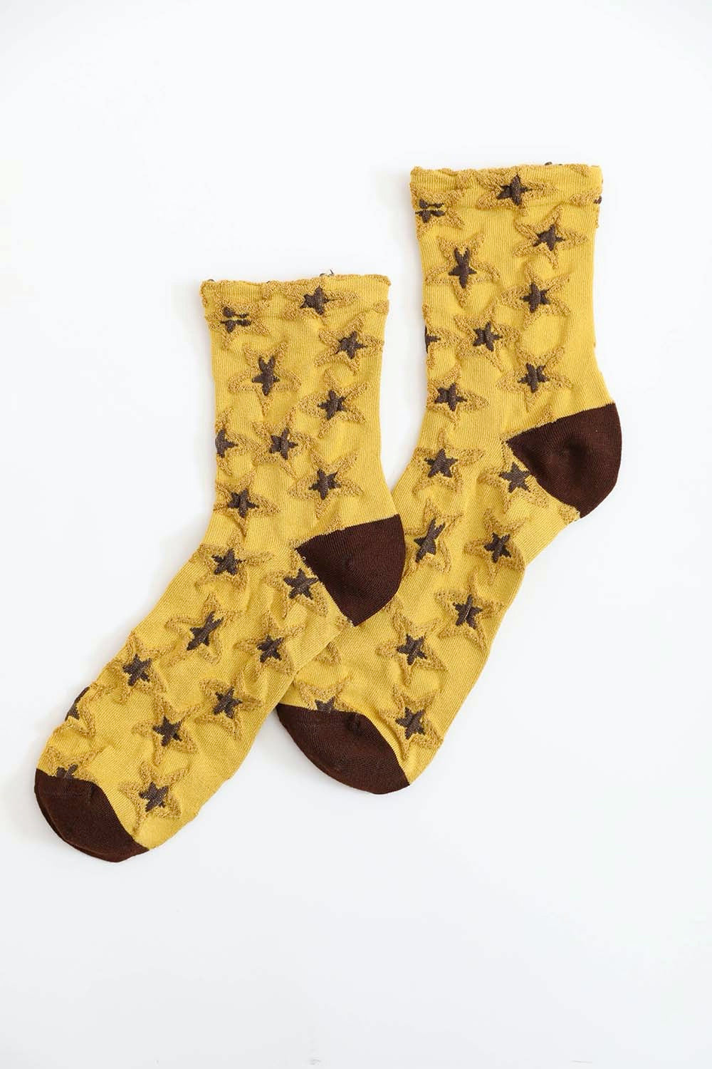 A pair of eco-friendly socks featuring a playful star design, showcasing their soft texture and vibrant colors.