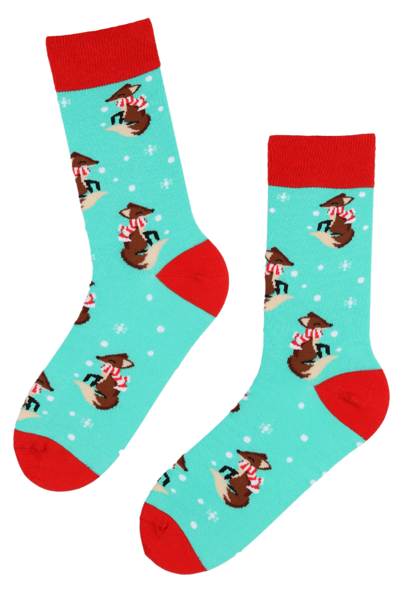 A pair of blue cotton socks featuring cute fox designs, perfect for cozy wear during winter.