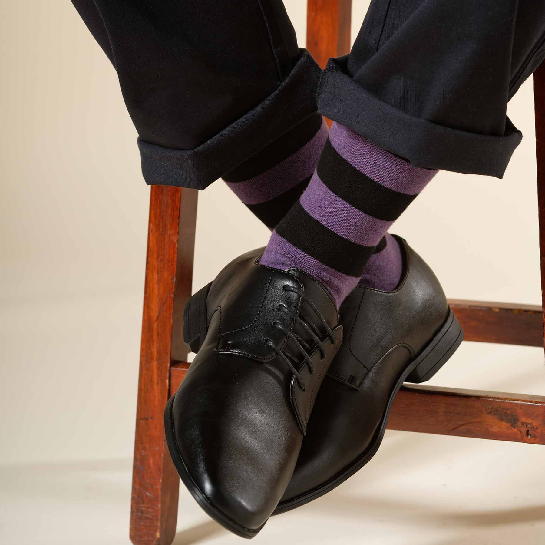 Equilibrium Organic Men's Socks in purple with black stripes and white line, showcasing sustainable fashion.