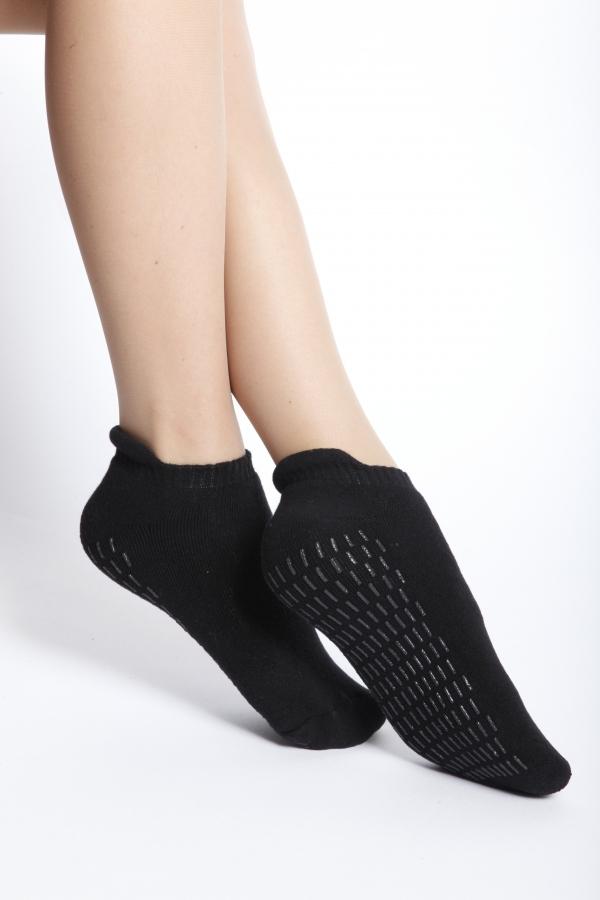 FINN women's black anti-slip socks featuring grips on the soles for enhanced safety and comfort.