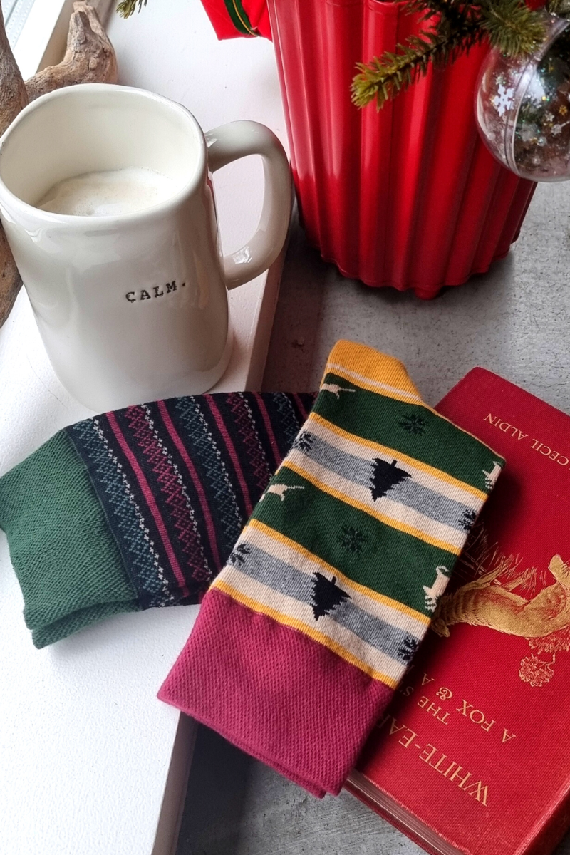 FROSTY striped cotton socks featuring a vibrant green and dark purple striped pattern, suitable for both men and women.