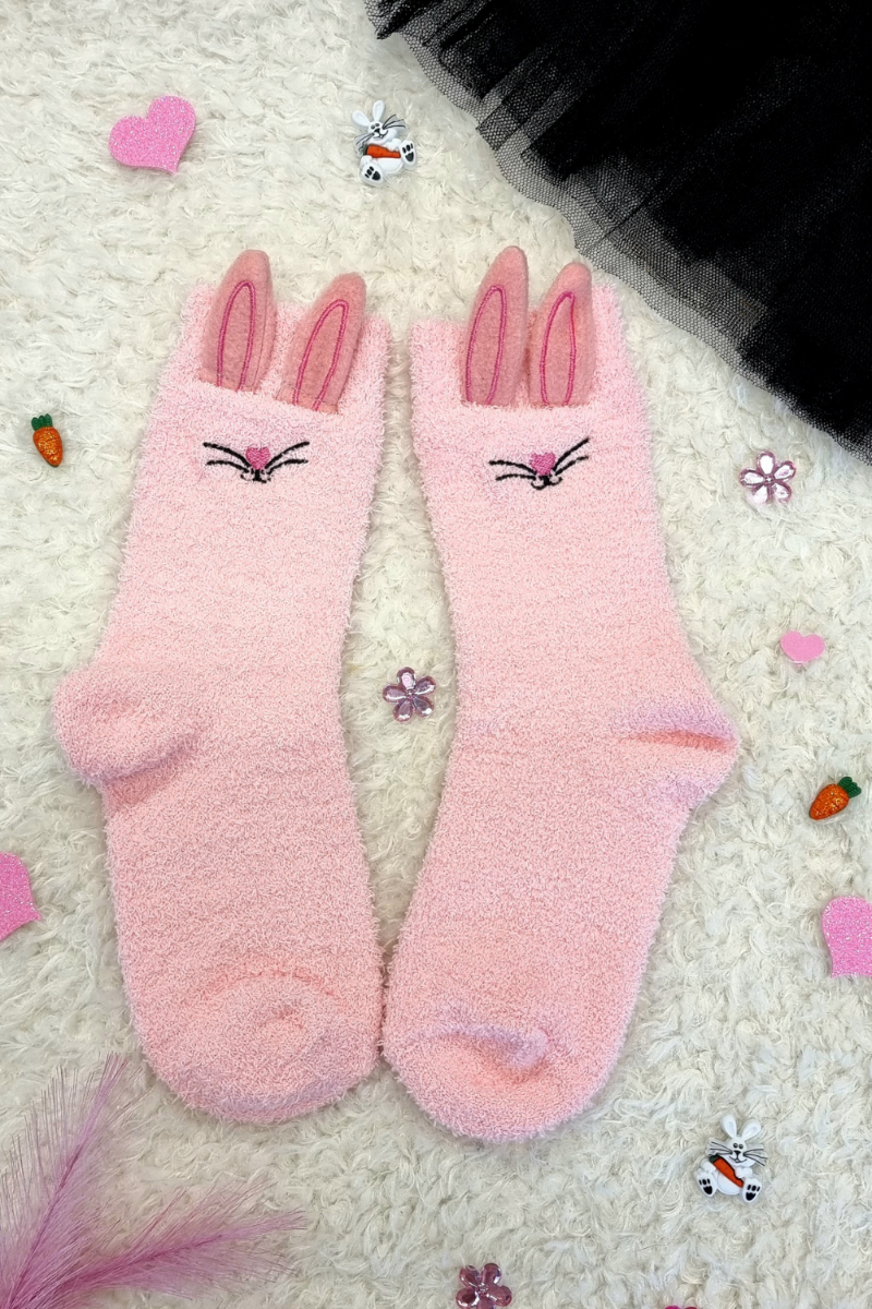 A pair of FUNNY BUNNY pink socks for women featuring cute bunny ears and a heart-shaped nose design, perfect for cozy lounging.