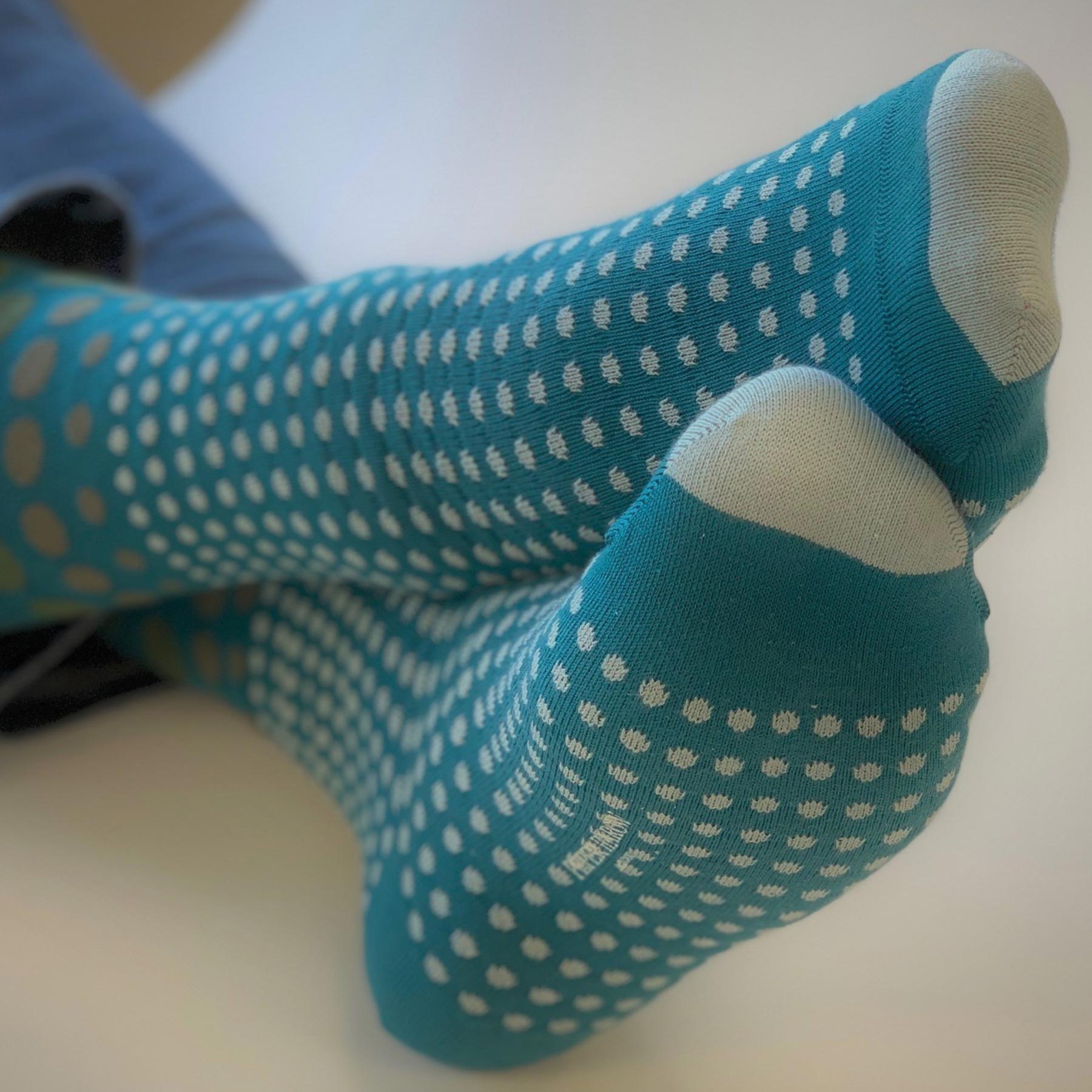 Teal Grad Polka Men's Socks featuring a stylish polka dot design in sage, olive, and pale blue colors.