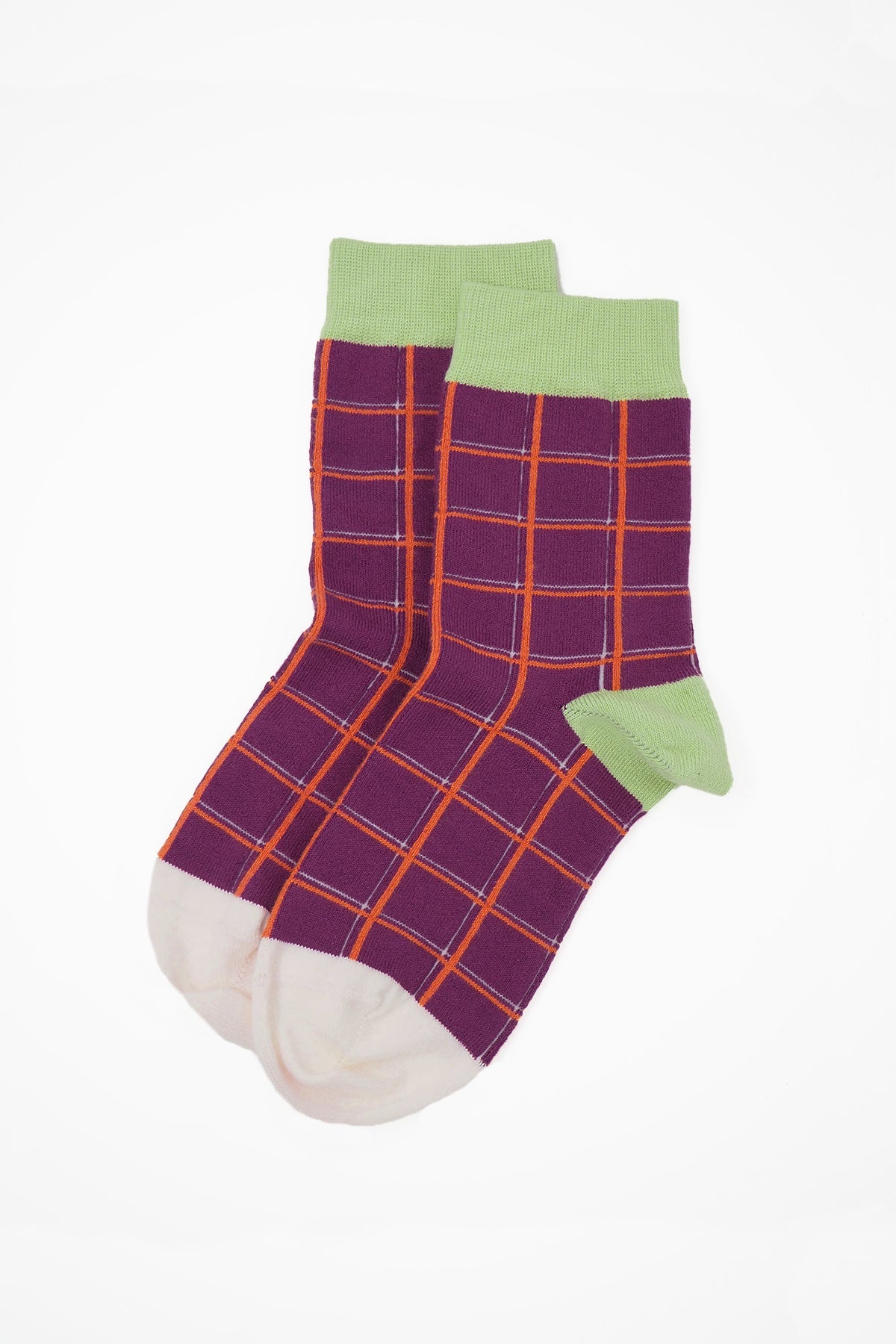 A pair of vibrant purple Grid Women's Socks featuring a stylish grid pattern, made from luxurious Supima cotton.