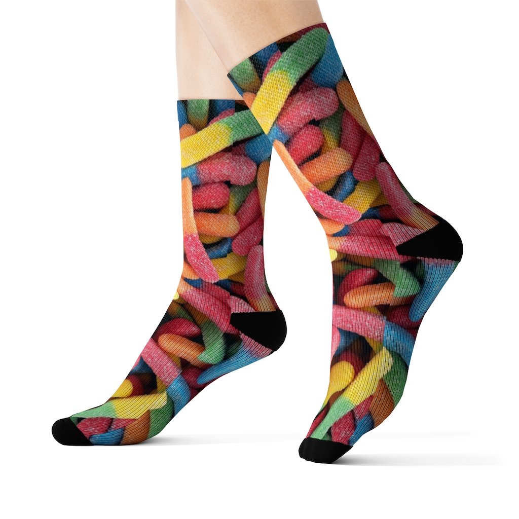 A pair of colorful Gummy Candy Novelty Socks featuring a vibrant candy print, perfect for adding a fun touch to any outfit.