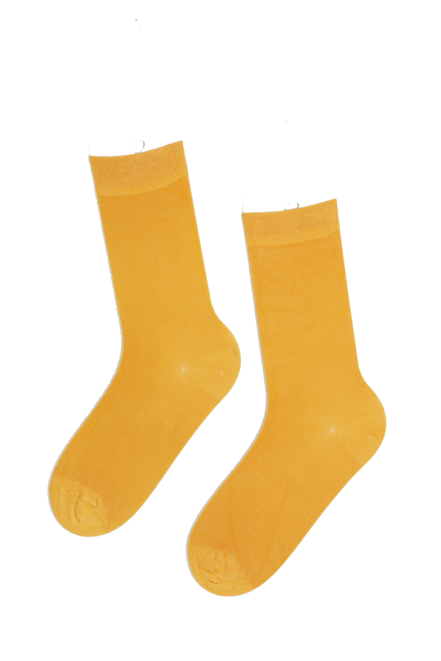 A pair of soft yellow women's socks made from viscose, showcasing their vibrant color and comfortable design.