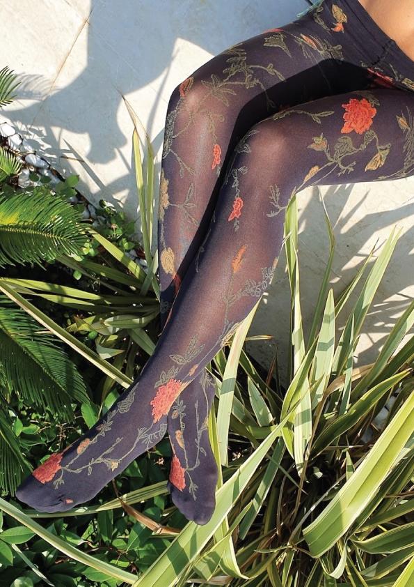 A pair of elegant black women's tights featuring beautiful rose designs, perfect for stylish everyday wear.