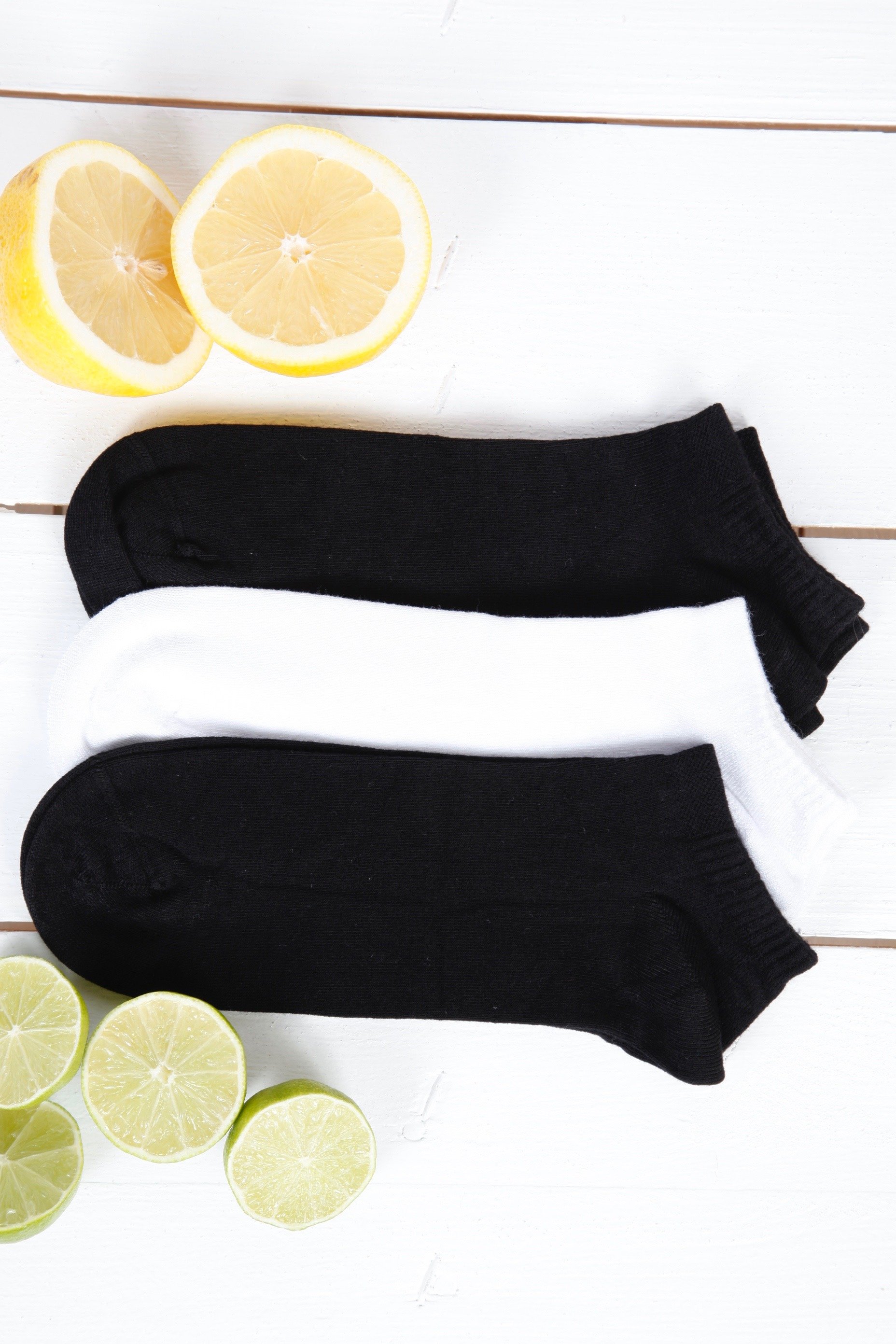 JOOSEP viscose low-cut socks for men in white and black, showcasing soft and stretchy material.