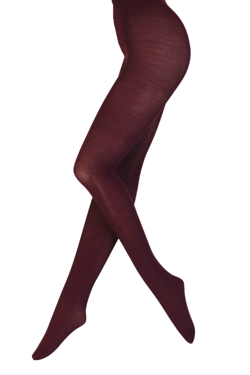 LENORE dark purple merino wool tights displayed elegantly, showcasing their soft texture and sheer finish.