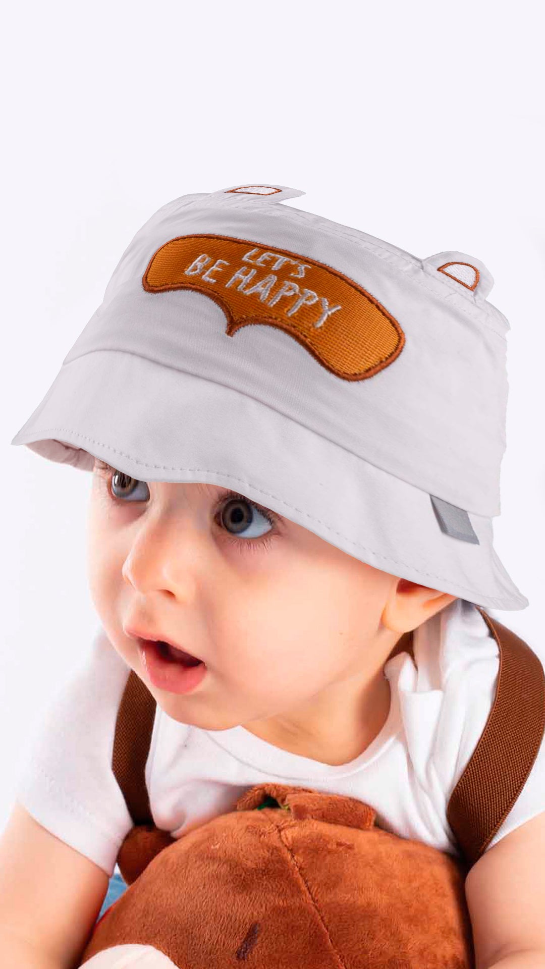 A white baby bucket hat with an adorable 'Let's Be Happy' appliqué, designed for children aged 1-3 years.