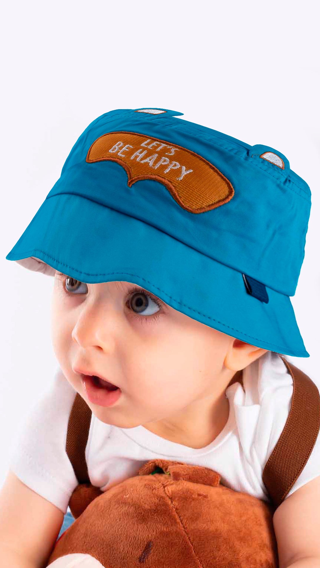 A white baby bucket hat with an adorable 'Let's Be Happy' appliqué, designed for children aged 1-3 years.