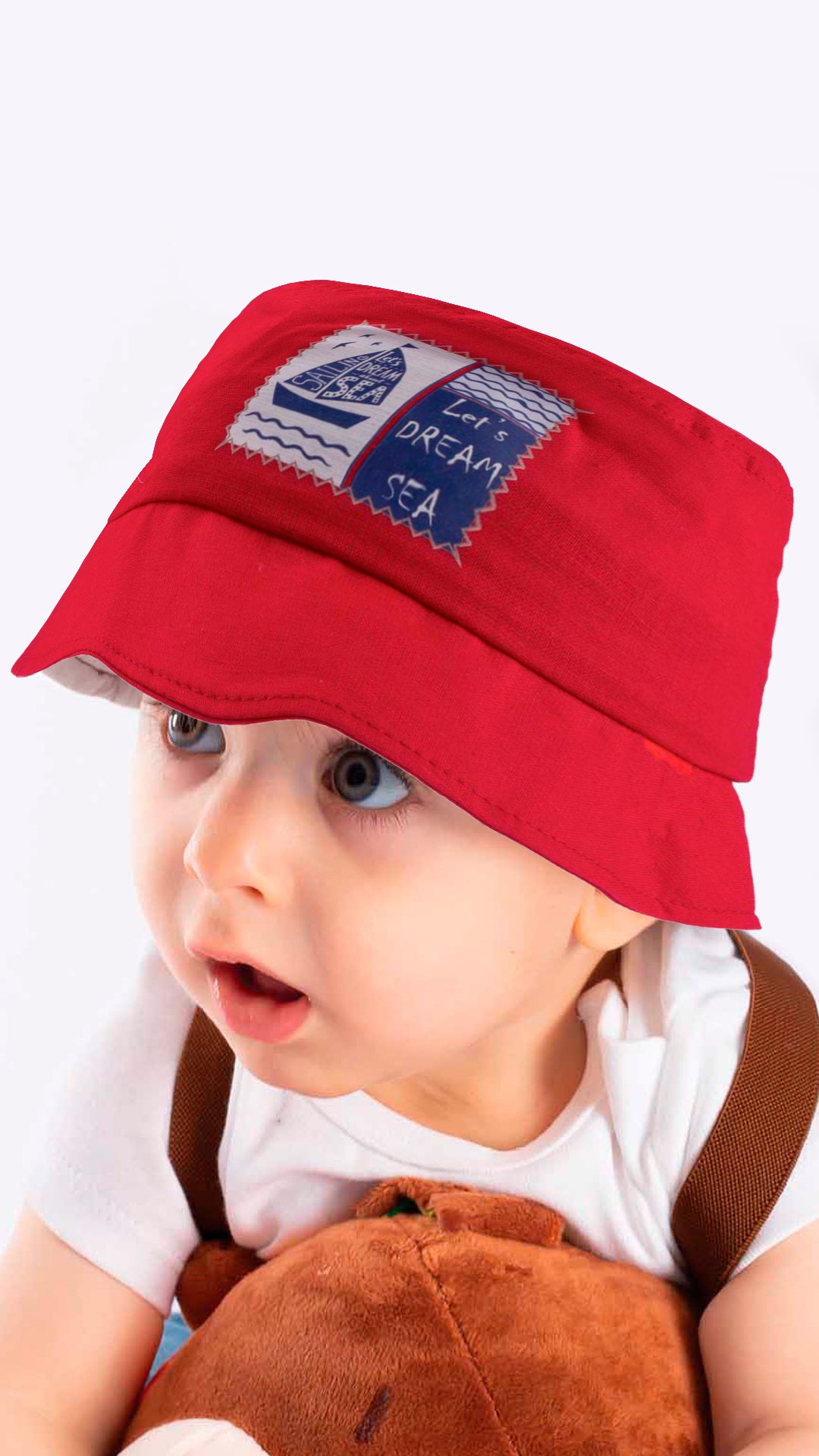 A stylish blue baby fedora hat with 'Let's Dream Sea' applique, designed for children aged 1-3 years, made from soft cotton and polyester blend.