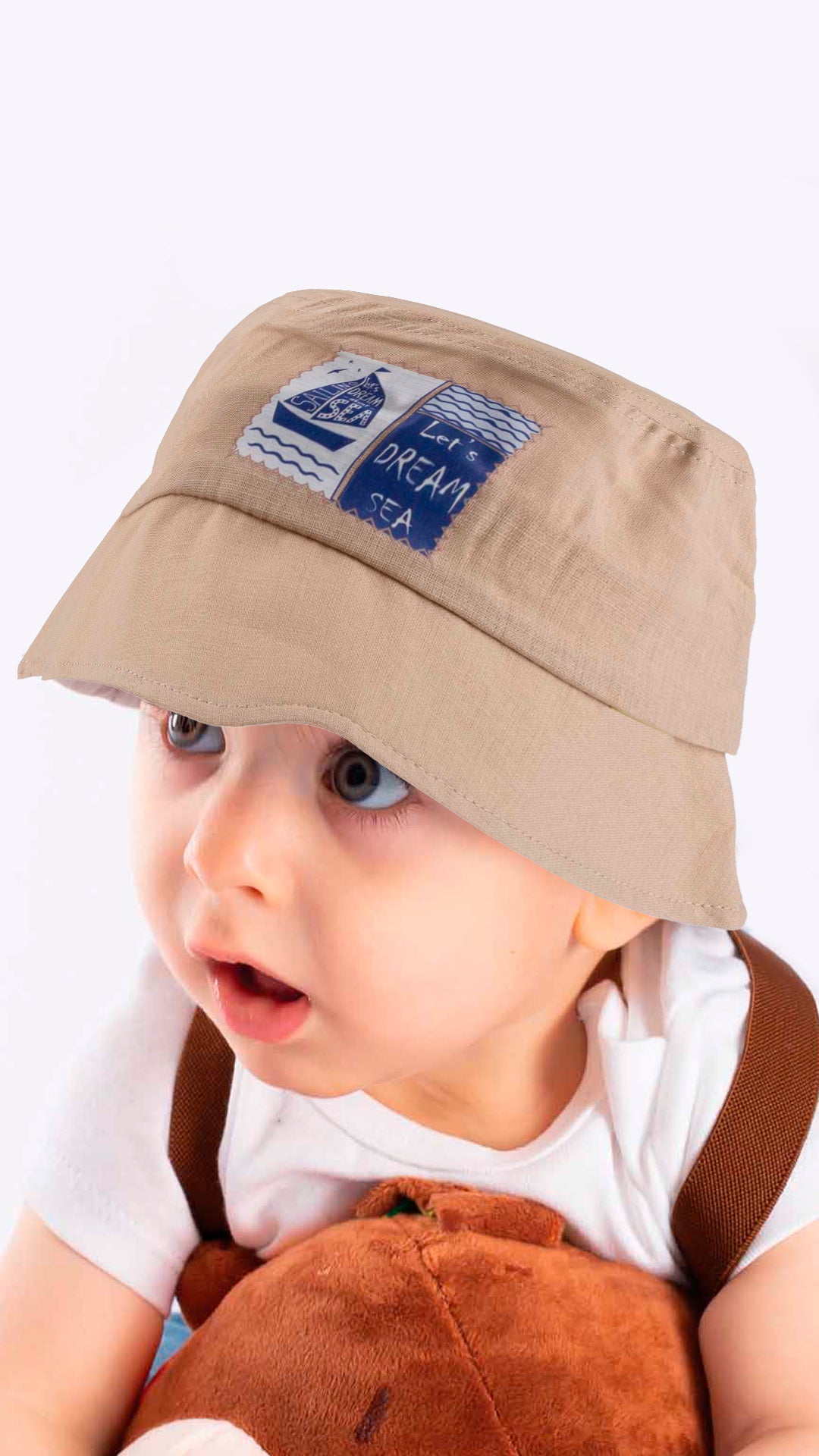 A stylish blue baby fedora hat with 'Let's Dream Sea' applique, designed for children aged 1-3 years, made from soft cotton and polyester blend.