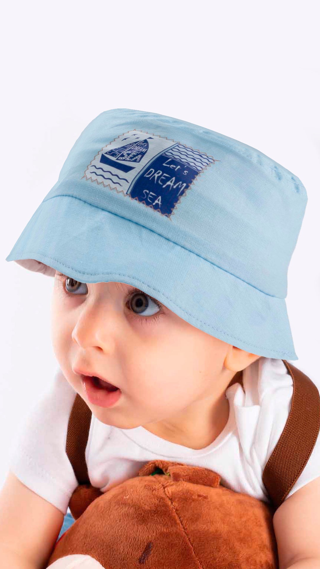 A stylish blue baby fedora hat with 'Let's Dream Sea' applique, designed for children aged 1-3 years, made from soft cotton and polyester blend.